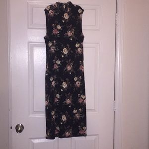 Black and flowery fitted dress